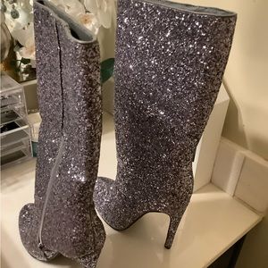 Boots , silver new without tag. Black checkered boots , worn once